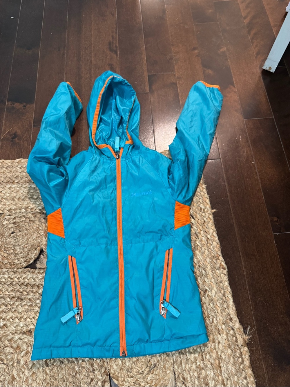 Marmot Turquoise Jacket with Orange Interior Trim